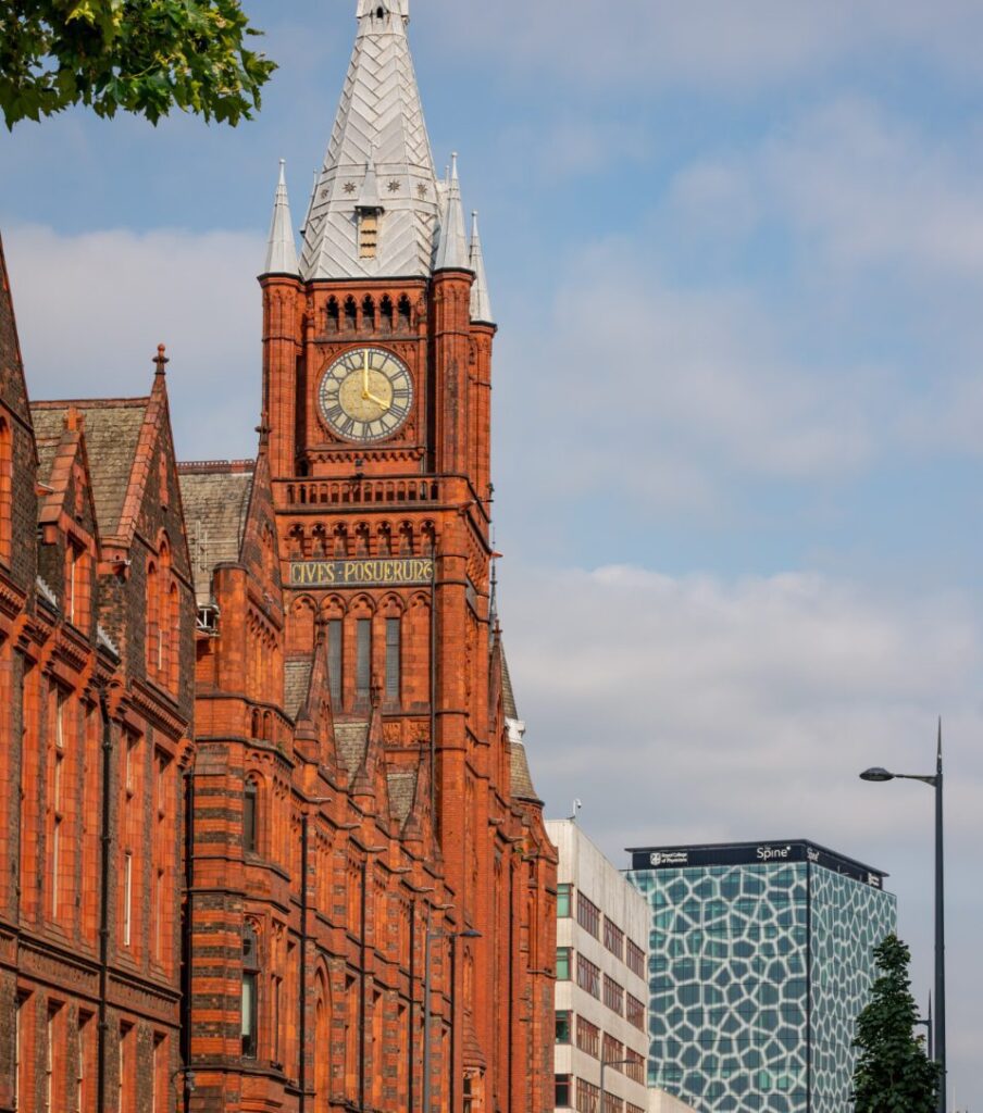 Outside the University of Liverpool with The Spine office building in the background