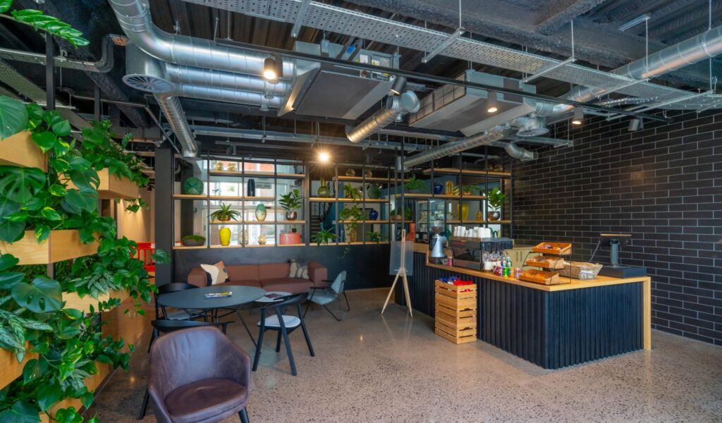 A coffee stall with tables and chairs