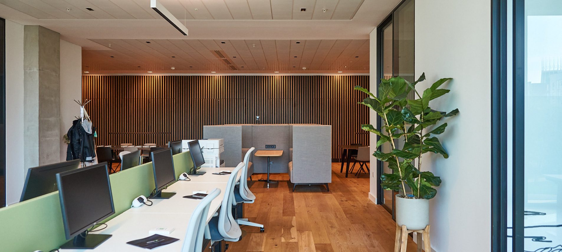 Office space with desks, chairs and computers