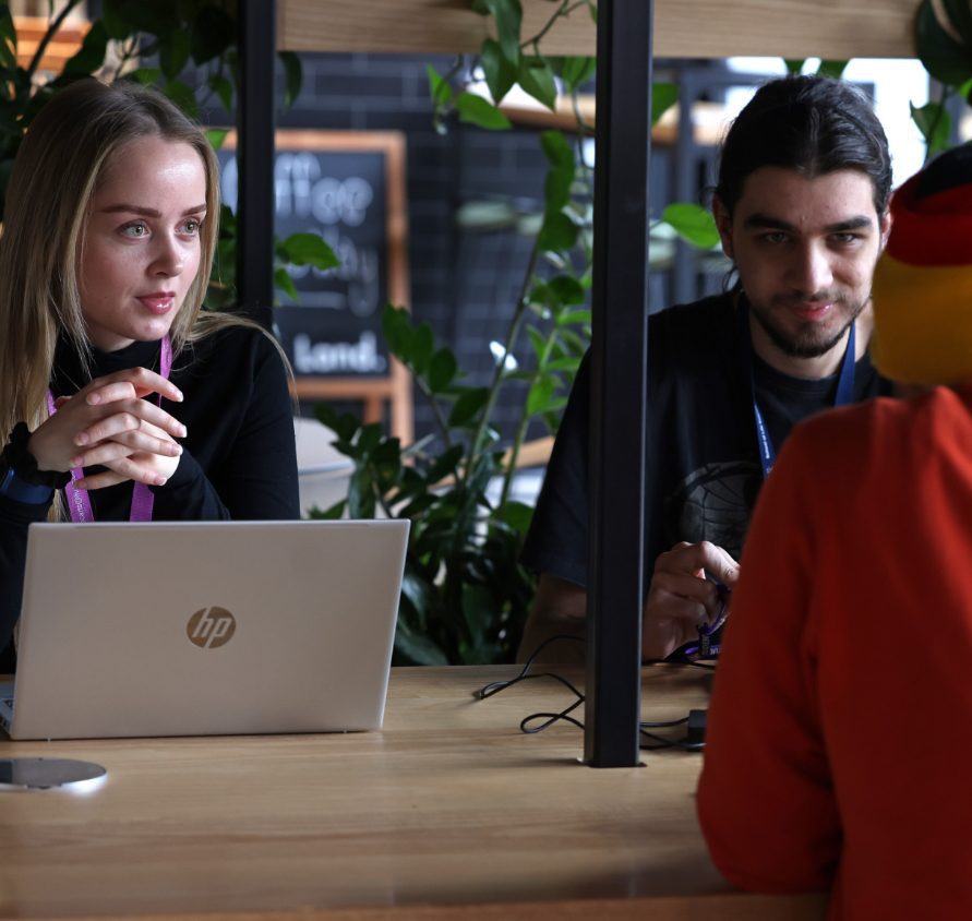 People in an office space in a meeting
