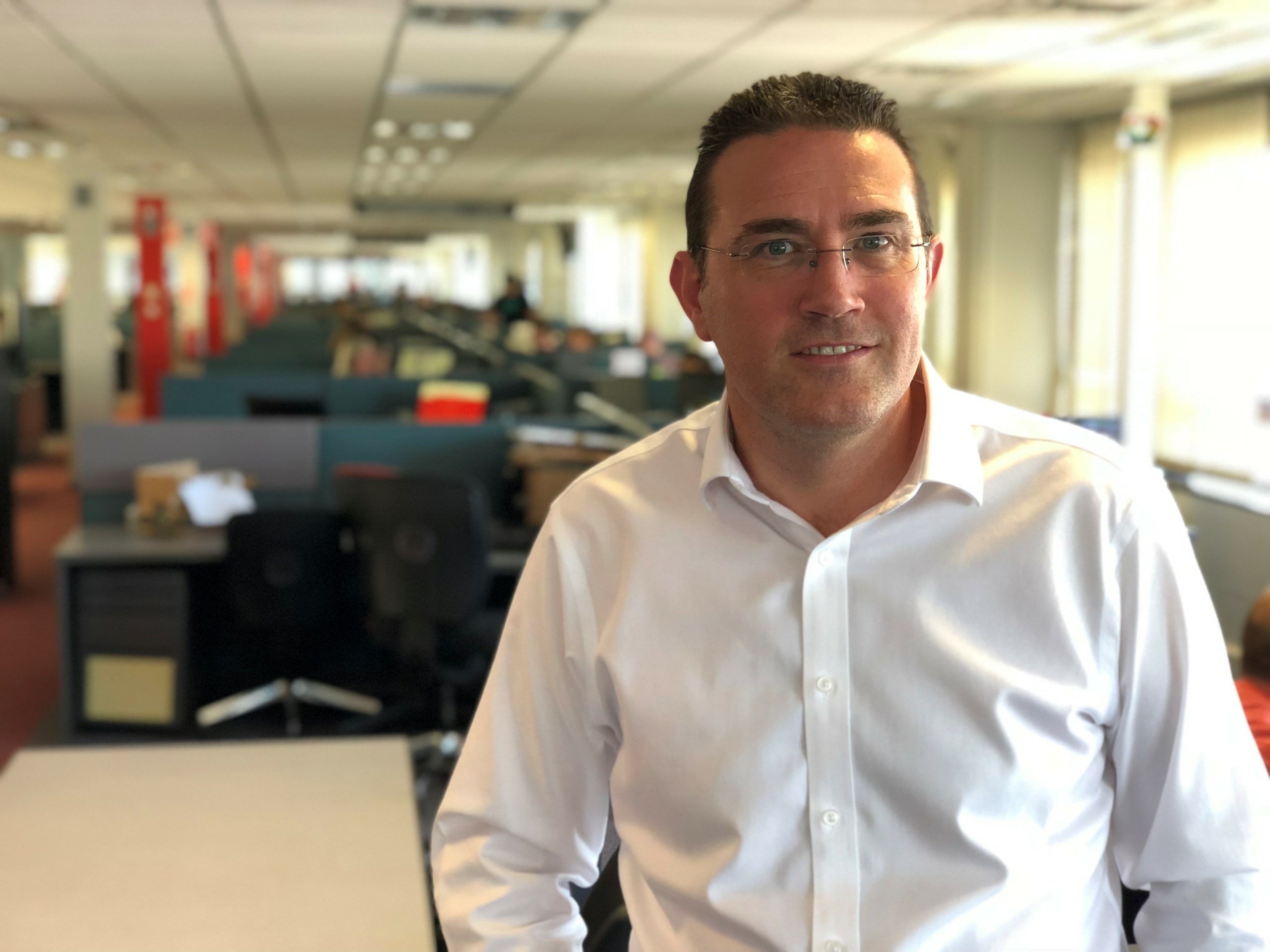 Colin Webb Cashplus Operations Director sitting in the office