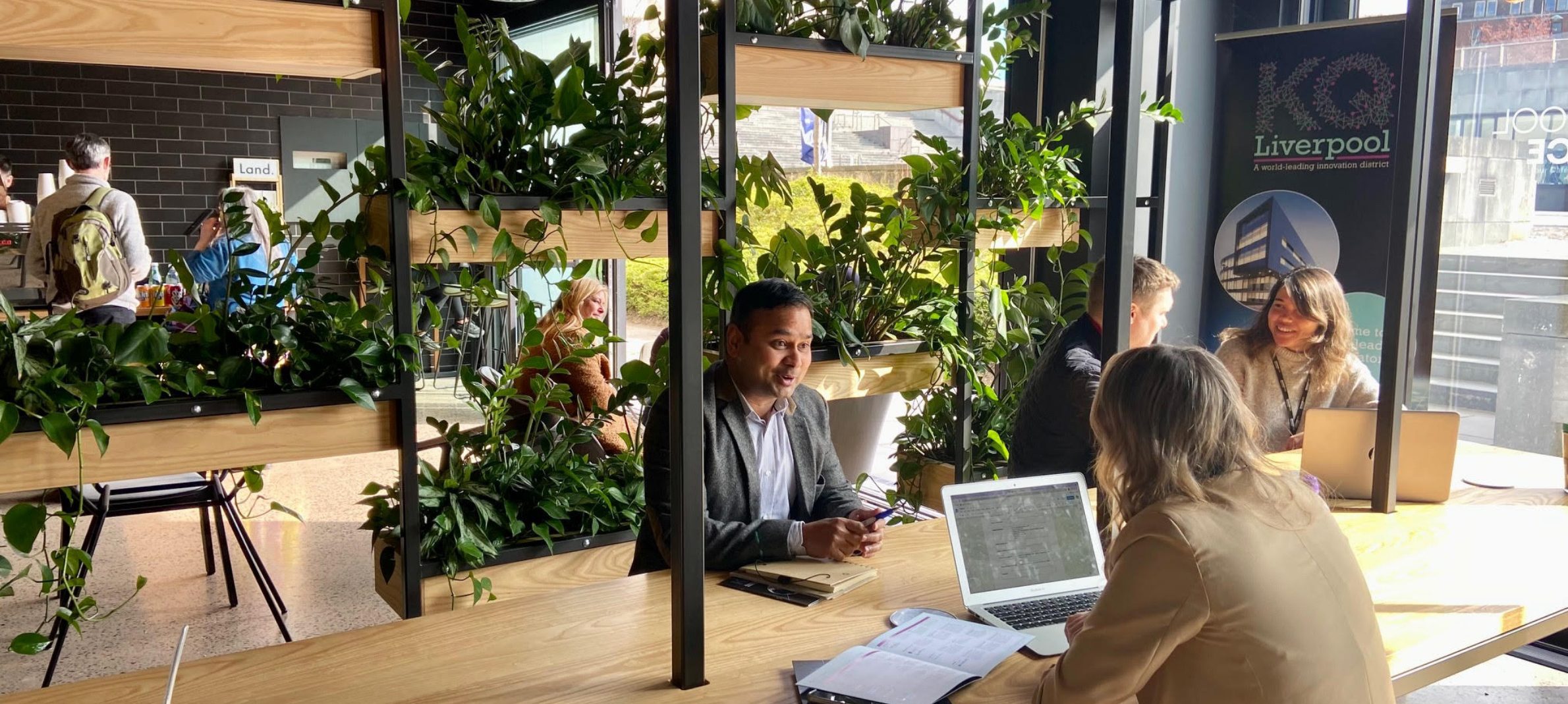 People working in an office space talking