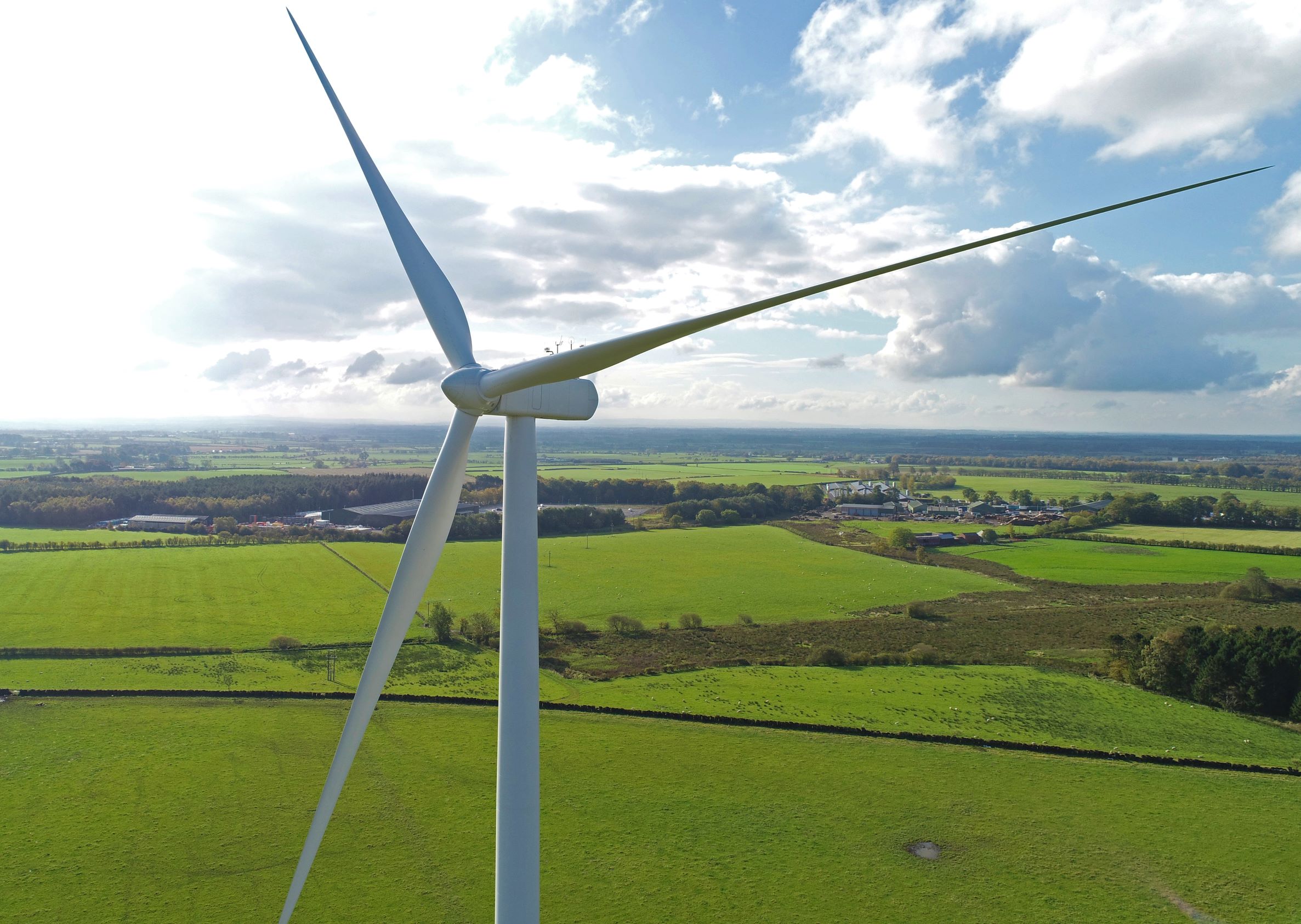 A wind turbine in a field